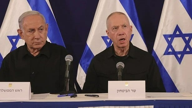 Abir Sultan/Pool Photo via AP, File : From left, Israeli Prime Minister Benjamin Netanyahu and Defense Minister Yoav Gallant speak during a news conference in the Kirya military base in Tel Aviv, Israel on Oct. 28, 2023. 